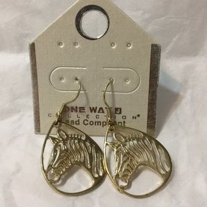 Gold tear shaped dangling zebra earrings with fishhook backs